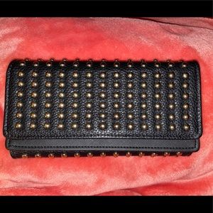 Black and gold studded clutch wallet